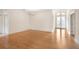 Spacious foyer with hardwood floors and double doors at 9143 Willow Brook Dr, Sarasota, FL 34238