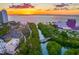 An aerial shot captures the essence of Sarasota, FL, with a beautiful water view and picturesque setting sun at 1305 4Th St # 402P, Sarasota, FL 34236