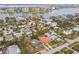 Aerial view of neighborhood with mature trees, waterfront access, and stunning city views at 745 Bruce Ave, Clearwater Beach, FL 33767