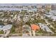 An aerial view of homes on a shore in a tropical area at 745 Bruce Ave, Clearwater Beach, FL 33767