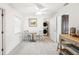 Bright dining area with a table, chairs, laundry area, and natural light at 745 Bruce Ave, Clearwater Beach, FL 33767