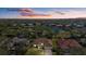 Luxury home on golf course with lake views and lush landscaping at 8111 Fairhaven Glen, University Park, FL 34201