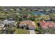 Golf course community home with pool and lake views at 8111 Fairhaven Glen, University Park, FL 34201