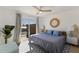 Beach-style bedroom with king-size bed and coastal decor at 303 65Th St # B, Holmes Beach, FL 34217