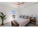 Bedroom with king-size bed and access to private deck at 303 65Th St # B, Holmes Beach, FL 34217