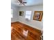 Bedroom featuring hardwood floors and large windows at 3642 Dartmouth N Ave, St Petersburg, FL 33713