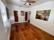 Bedroom with hardwood floors and window with natural light at 3642 Dartmouth N Ave, St Petersburg, FL 33713