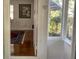 Home entryway showing view into living room with hardwood floors at 3642 Dartmouth N Ave, St Petersburg, FL 33713