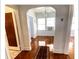 Hallway with hardwood floors leading to other rooms at 3642 Dartmouth N Ave, St Petersburg, FL 33713