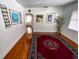 Living room with hardwood floors and large windows at 3642 Dartmouth N Ave, St Petersburg, FL 33713