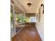 Front porch with terracotta tile floor and lattice details at 3642 Dartmouth N Ave, St Petersburg, FL 33713