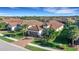 One-story house with tile roof, landscaping and paver driveway in a residential neighborhood at 5397 Bartolomeo St, Sarasota, FL 34238