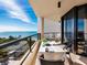 Balcony with ocean view and patio furniture at 1211 Gulf Of Mexico Dr # 408, Longboat Key, FL 34228