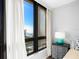 Bedroom with ocean view and white curtains at 1211 Gulf Of Mexico Dr # 408, Longboat Key, FL 34228