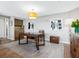 Dedicated home office space with built-in shelving and hardwood floors at 1211 Gulf Of Mexico Dr # 408, Longboat Key, FL 34228