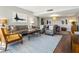 Open concept living room with hardwood floors and comfortable seating at 1211 Gulf Of Mexico Dr # 408, Longboat Key, FL 34228