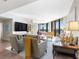 Open concept living room with hardwood floors and stunning ocean views at 1211 Gulf Of Mexico Dr # 408, Longboat Key, FL 34228