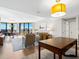 Open concept living area with hardwood floors and modern furnishings at 1211 Gulf Of Mexico Dr # 408, Longboat Key, FL 34228