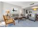 Elegant living room with hardwood floors and comfortable seating at 1211 Gulf Of Mexico Dr # 408, Longboat Key, FL 34228
