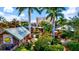 Aerial view of a miniature golf course with tropical landscaping at 13021 Indigo Way, Bradenton, FL 34211