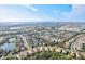 Aerial view of a residential neighborhood with lakes and lush greenery at 13021 Indigo Way, Bradenton, FL 34211