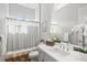 Clean bathroom, featuring a shower and double vanity at 13021 Indigo Way, Bradenton, FL 34211