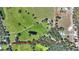 Aerial view of property showing house, pool, and expansive land at 8965 Bunker Hill Rd, Duette, FL 34219