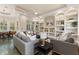Spacious living room with built-in shelving and comfortable seating at 8965 Bunker Hill Rd, Duette, FL 34219