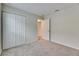 Spacious bedroom with double door closet and carpet flooring at 1006 Hagle Park Rd, Bradenton, FL 34212