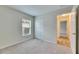 Well-lit bedroom with a closet and access to a hallway at 1006 Hagle Park Rd, Bradenton, FL 34212