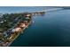 Aerial view of waterfront homes and bridge at 3320 Gulf Of Mexico Drive # 208C, Longboat Key, FL 34228