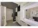 Modern bathroom with a glass shower, white tile, and a floating vanity at 4844 Brywill Cir, Sarasota, FL 34234