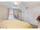 Bright bedroom featuring a king-size bed and ample closet space at 6713 Stone River Rd # 104, Bradenton, FL 34203