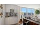 Modern wet bar with white cabinets and granite counter at 707 S Gulfstream Ave # 604, Sarasota, FL 34236