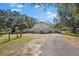 Spacious barn with double doors and a long driveway at 7146 Territory Ln, Sarasota, FL 34240