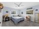 Charming bedroom with a queen-size bed and plenty of natural light at 7146 Territory Ln, Sarasota, FL 34240