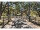 Driveway entrance to home with mature trees overhead at 7146 Territory Ln, Sarasota, FL 34240