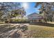 Front view of two story home with covered porch at 7146 Territory Ln, Sarasota, FL 34240