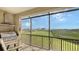 Screened balcony with outdoor grill and water views at 1309 3Rd Street E Cir, Palmetto, FL 34221