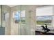 Elegant bathroom with marble shower and stunning water views at 1309 3Rd Street E Cir, Palmetto, FL 34221