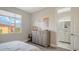 Bright bedroom with built-in dresser and en-suite bathroom at 1309 3Rd Street E Cir, Palmetto, FL 34221