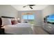 Spacious bedroom with water views and updated flooring at 1309 3Rd Street E Cir, Palmetto, FL 34221