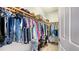 Large walk-in closet with ample shelving and hanging space at 1309 3Rd Street E Cir, Palmetto, FL 34221