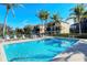 Relaxing community pool with plenty of lounge chairs at 1309 3Rd Street E Cir, Palmetto, FL 34221