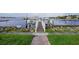 Community dock with walkway to boats in calm water at 1309 3Rd Street E Cir, Palmetto, FL 34221