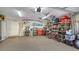 Organized garage with ample storage and epoxy floor at 1309 3Rd Street E Cir, Palmetto, FL 34221