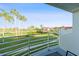 Balcony view overlooking a lush golf course and resort-style community at 6059 Bahia Del Mar Blvd # 239, St Petersburg, FL 33715