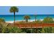 Wooden boardwalk leads to a beautiful beach with ocean views at 1211 Gulf Of Mexico Dr # 706, Longboat Key, FL 34228