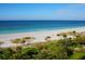 Stunning panoramic view of a pristine beach and ocean at 1211 Gulf Of Mexico Dr # 706, Longboat Key, FL 34228