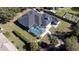 Aerial view showcasing the home's backyard oasis at 13634 7Th Avenue Ne Cir, Bradenton, FL 34212